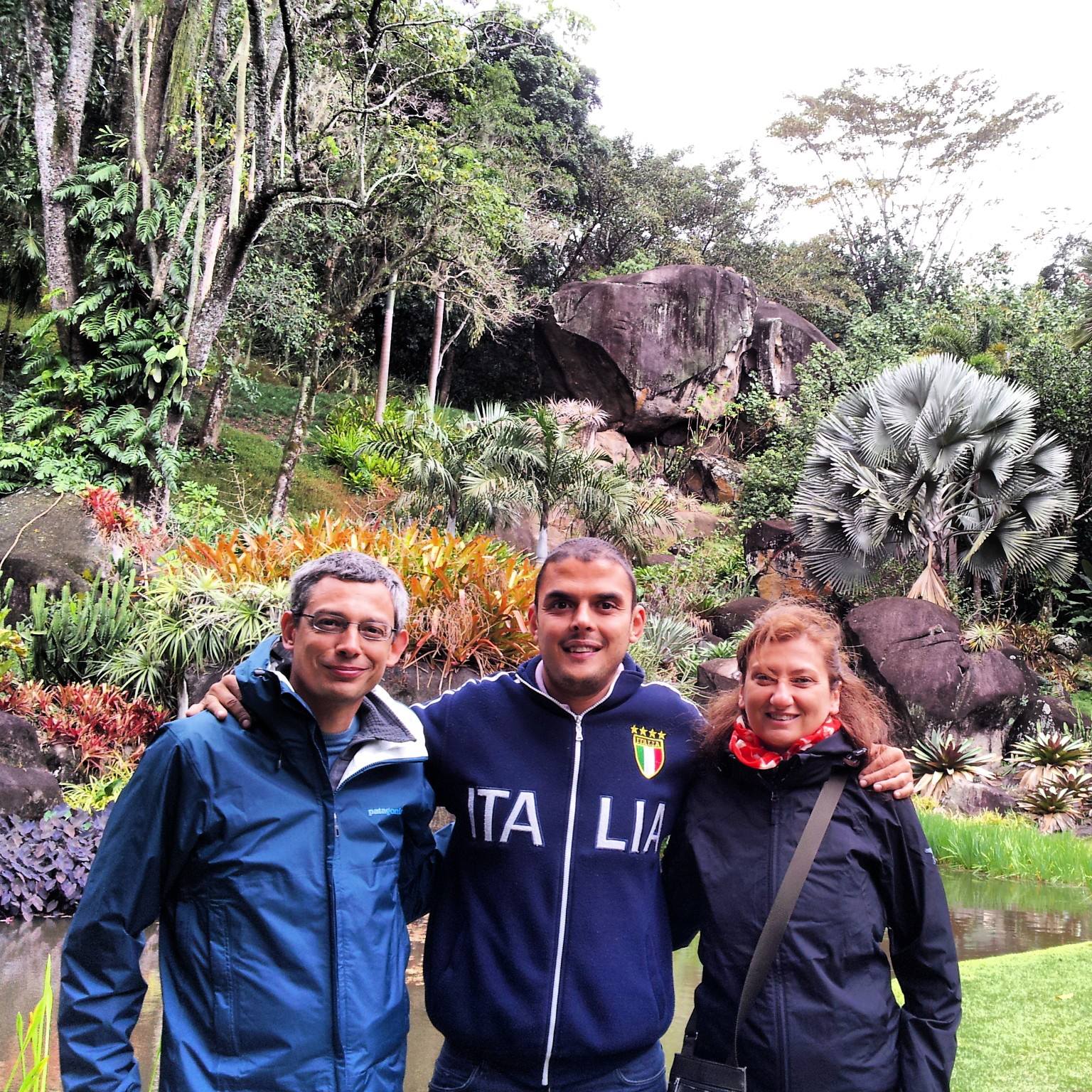 Tour guide Fabio with tourists on Burle Marx tour exploring the legendary landscape architect's garden estate in Rio de Janeiro