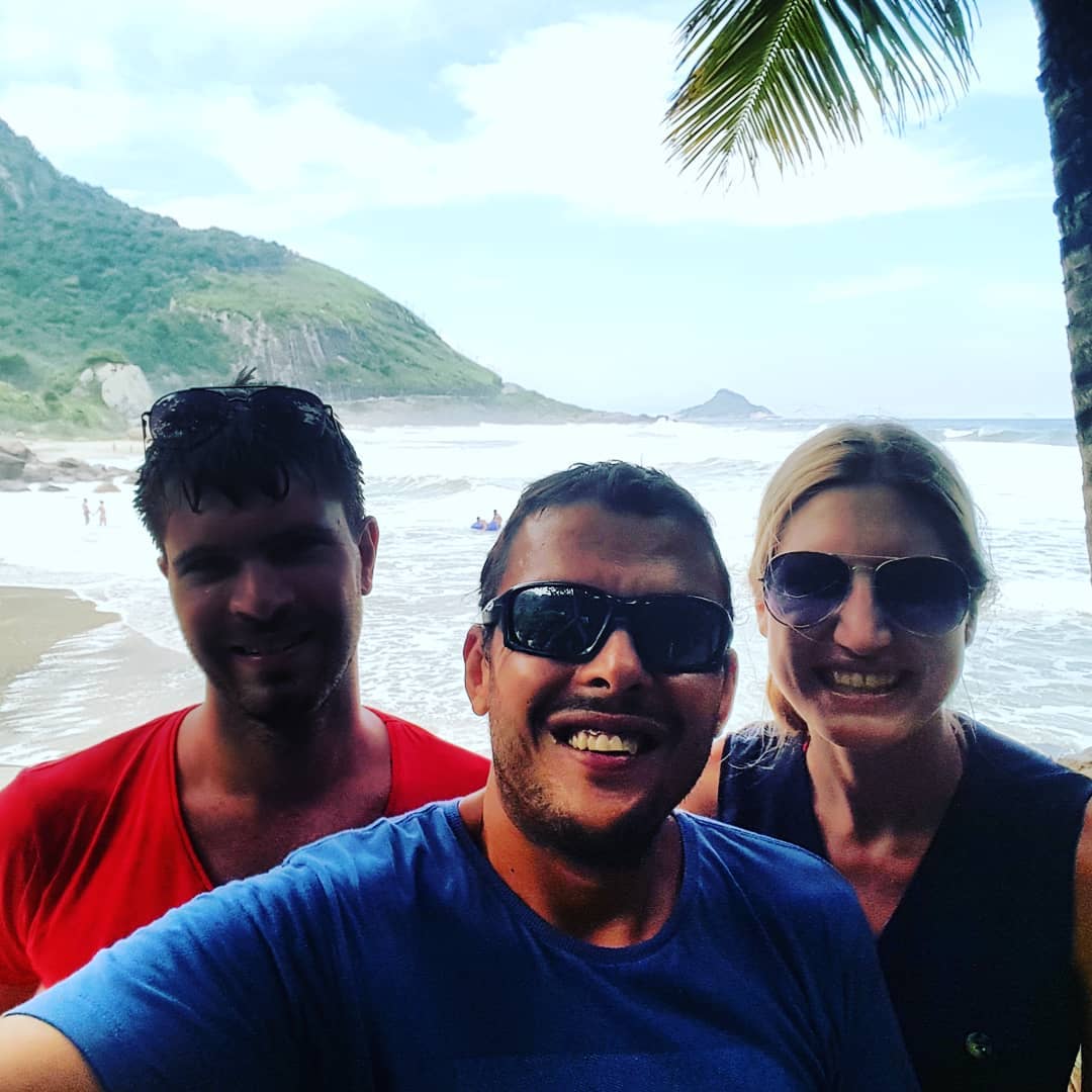 Tour guide Fabio with clients on day tour prainha grumari exploring Rio de Janeiro's hidden beaches
