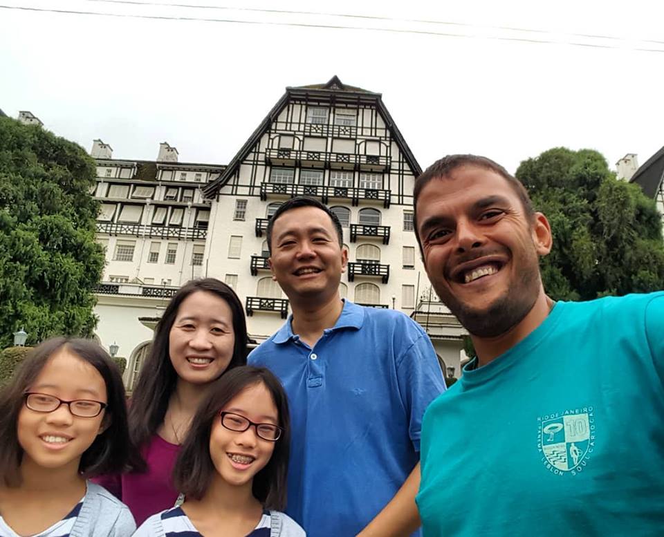 Happy travelers with their Brazilian tour guide enjoying a cultural day trip Petrópolis from Rio de Janeiro