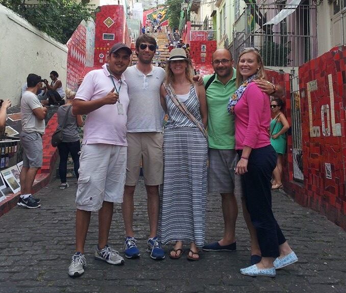 Tour guide Fabio with tourists on historic tour of Rio de Janeiro exploring colonial architecture and cultural landmarks