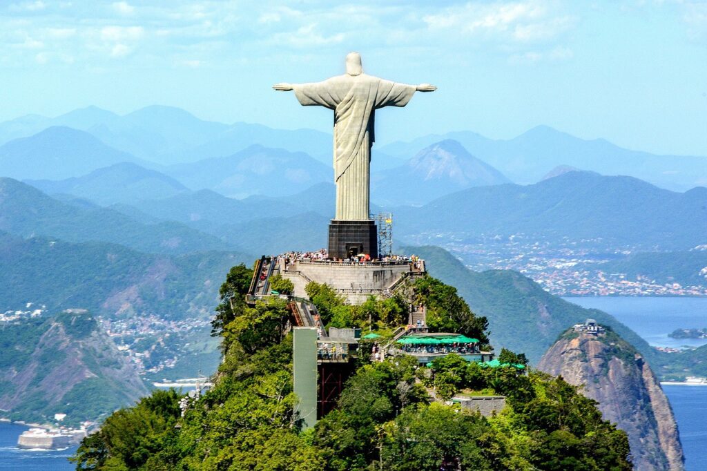 Scenic Corcovado train ride through Atlantic Forest to Cristo Redentor - Brazil's engineering marvel since 1884 Historic Corcovado train traveling through Tijuca Forest to Christ the Redeemer statue in Rio de Janeiro