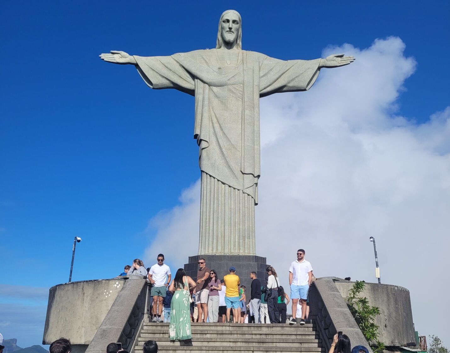 Rio de Janeiro sunset tour with Sugar Loaf and Christ the Redeemer by train showcasing golden hour views over Guanabara Bay and the cable car ascending Pão de Açúcar