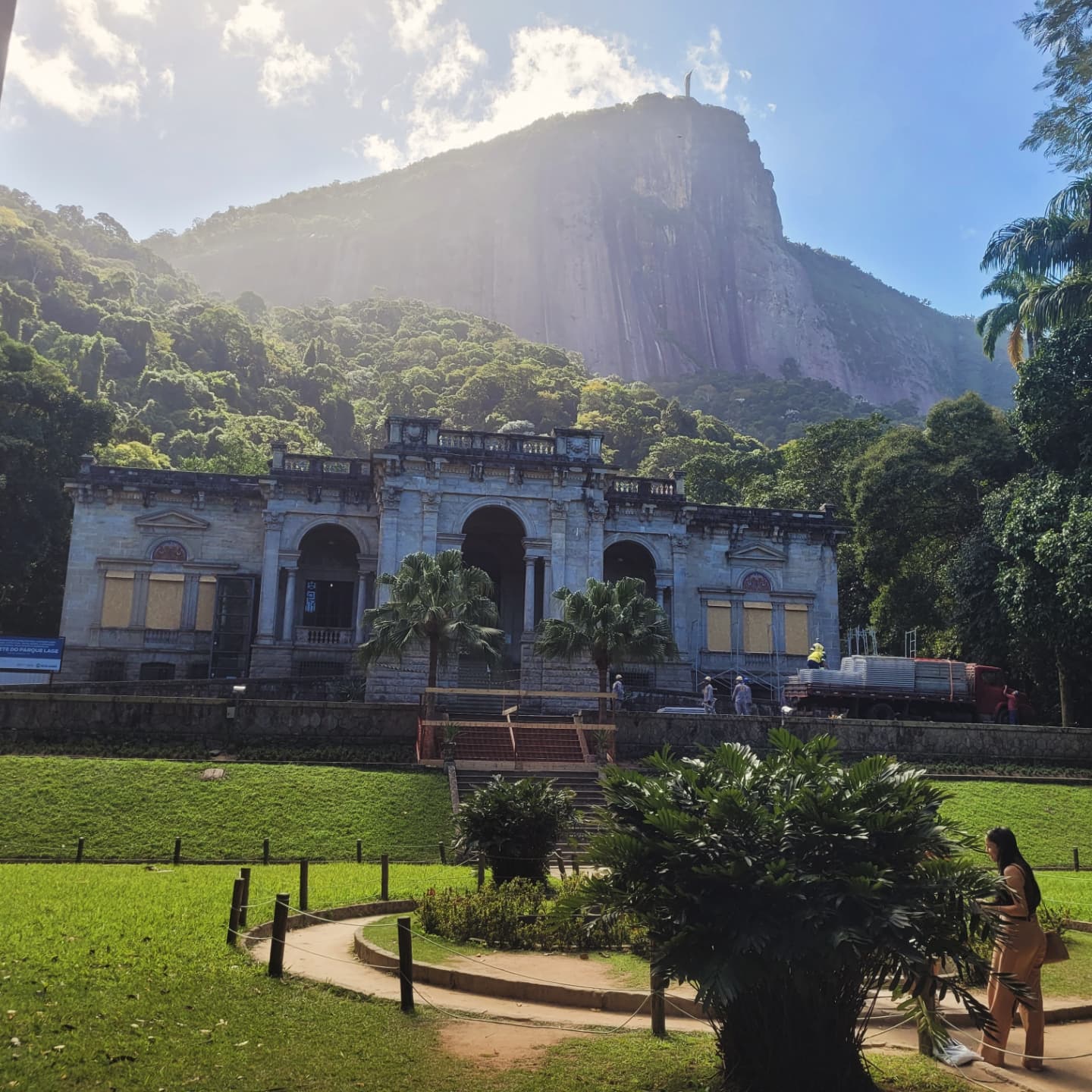 Instagram tour Rio de Janeiro featuring Parque Lage mansion with Christ the Redeemer statue visible in background framed by lush Atlantic rainforest and colonial architecture