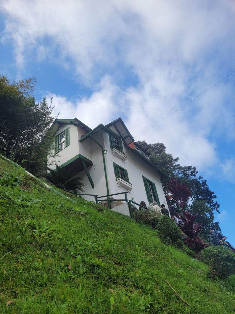 Historic hillside house with green shutters on a private Petrópolis tour in Rio de Janeiro