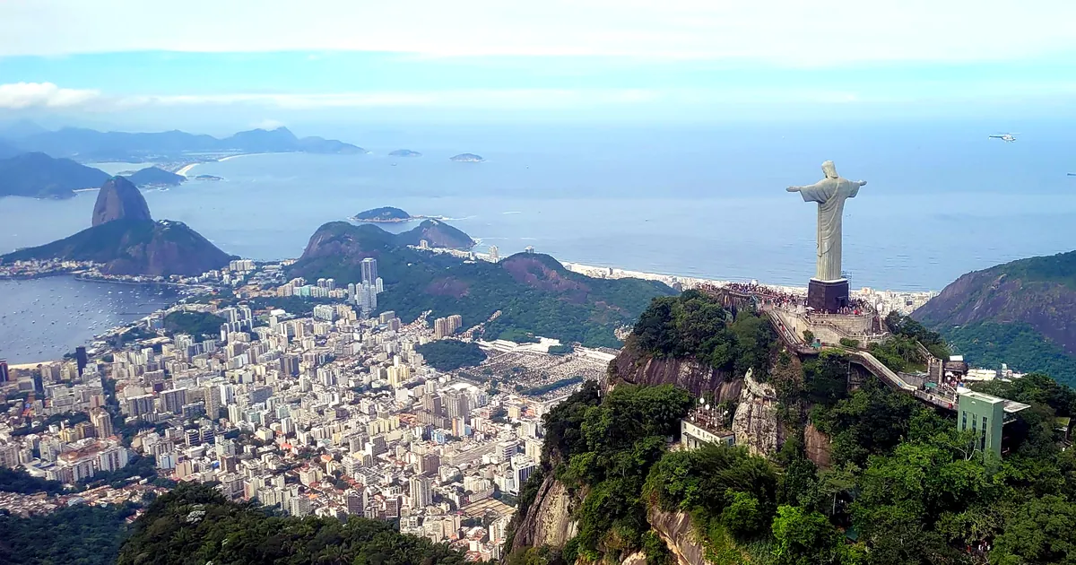 Christ the Redeemer overlooking Sugarloaf Mountain, Botafogo and Copacabana in Rio de Janeiro - November in Rio de Janeiro