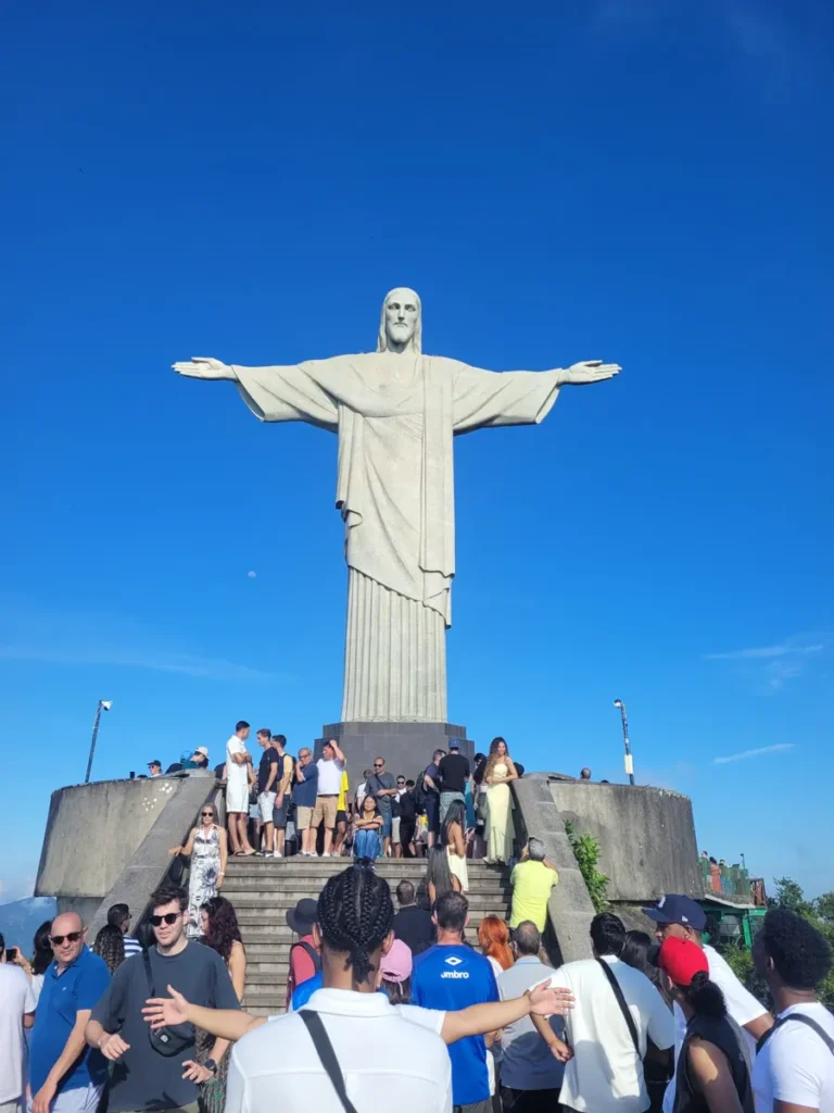 Visitors at Christ the Redeemer on a clear day in Rio de Janeiro