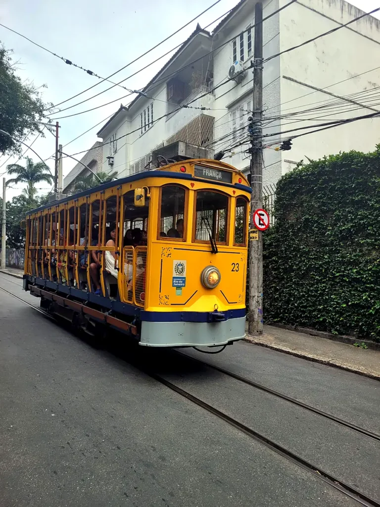 Yellow vintage tram (bondinho) on the streets of Santa Teresa, Rio de Janeiro